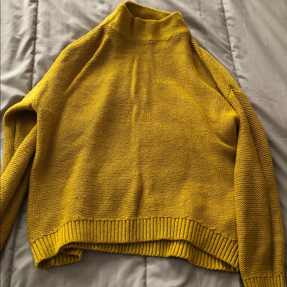 Mockneck mustard color sweater. Medium